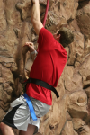 Man Climbing Three Story Indoor Rock Wall in Appleton